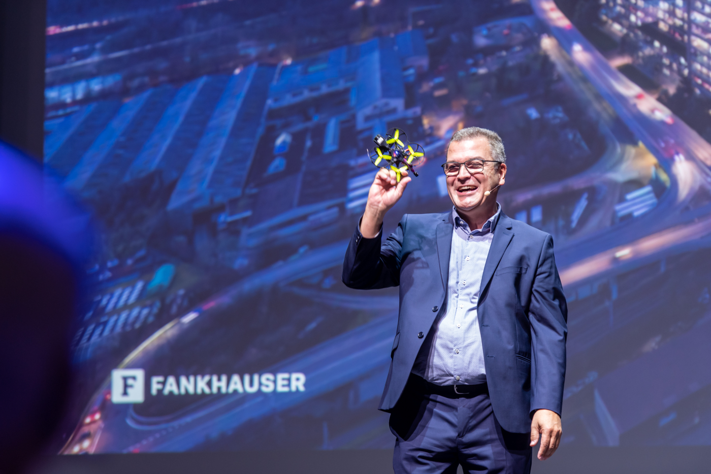 Fotos der Eröffnungsfeier, Hans-Jörg Fankhauser, Architekt und Arealentwickler, präsentiert das Projekt und die Vision von uptownBasel. © Copyright | Digitale Medienmappe «Offizielle Eröffnung von uptownBasel, dem internationalen Kompetenzzentrum für Industrie 4.0», uptownBasel